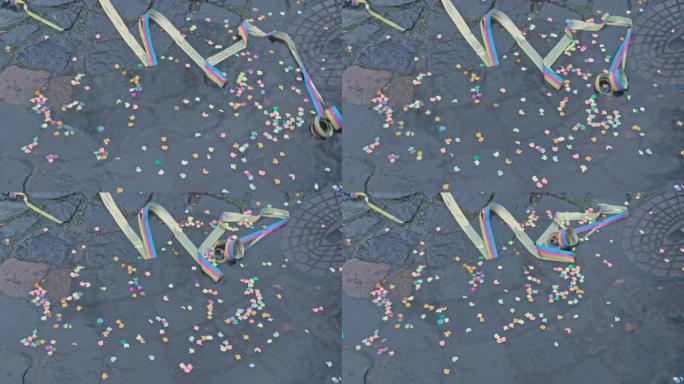 雨中的街头派对-水坑中的五彩纸屑和彩带