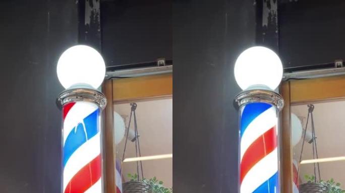 传统理发店杆。旋转条纹灯杆发廊。沙龙理发师美发标志。