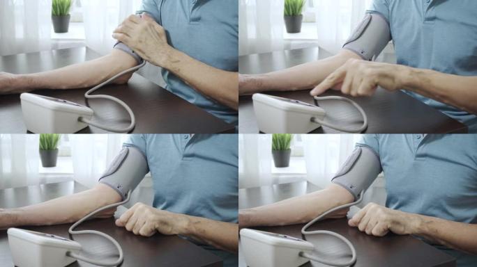 一位老人正在测量他的血压
