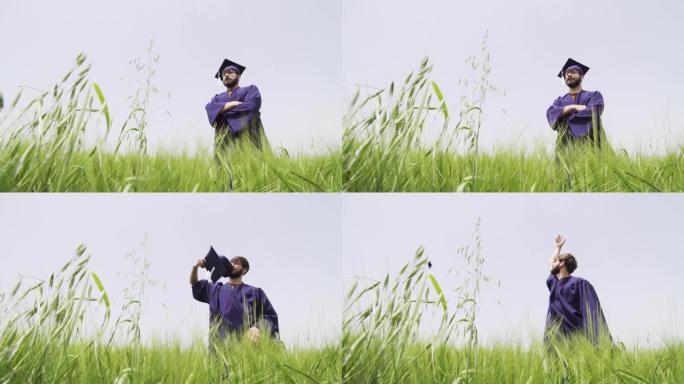 穿着毕业服装的年轻人在绿色的田野上向空中扔帽子 ..