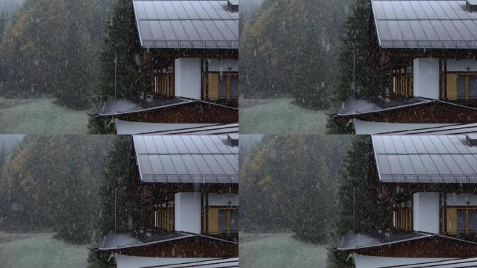 在郊区附近的大雪中，带有经典木屋的冬季景观