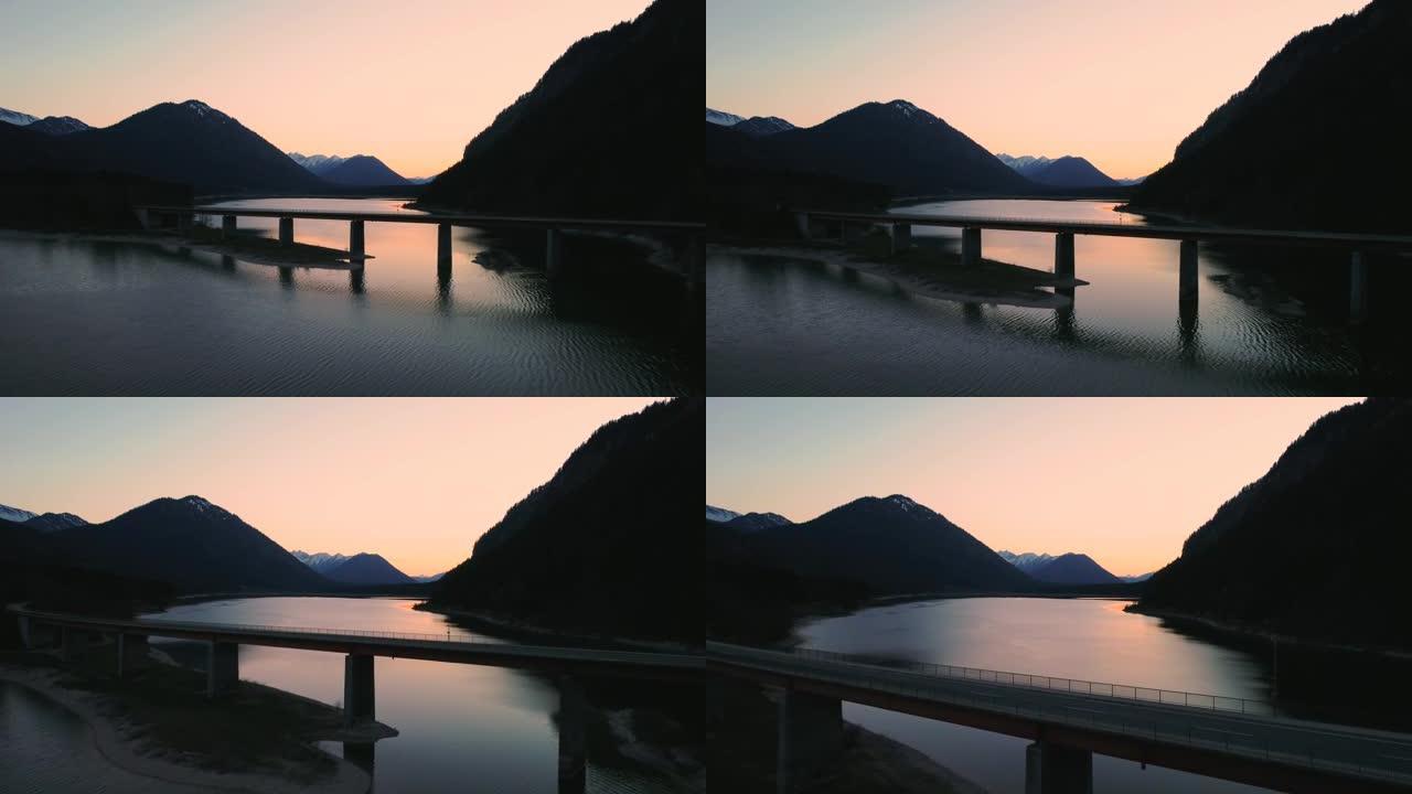 西尔文斯坦大坝淡水饮用水水库大桥在风景秀丽的巴伐利亚奥地利阿尔卑斯山，山脉和清澈的蓝色水在充满活力的