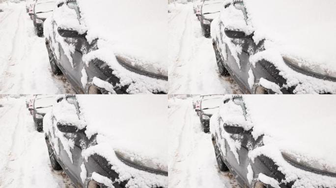 日光暴风雪中的一排停放的汽车-慢动作特写