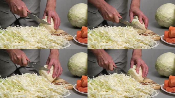 4K。男厨师用刀将新鲜的白菜切成薄片。酸菜的准备
