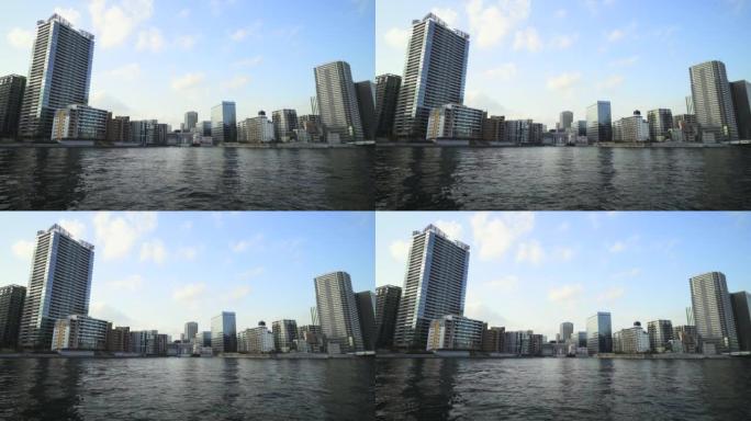 河畔的高层公寓建筑河水城市风光