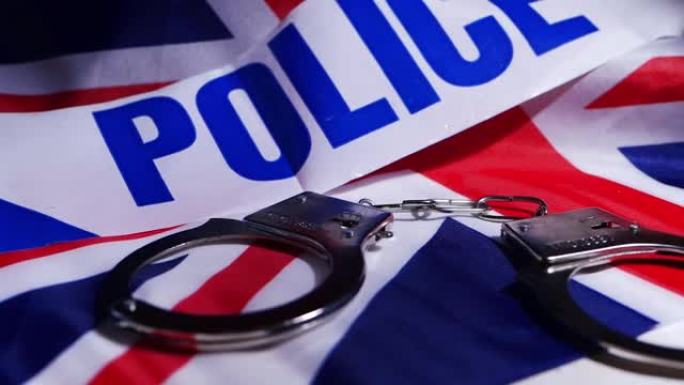 带手铐和英国国旗的英国警察部队概念