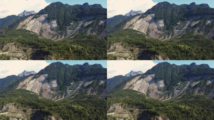 带Vaiont大坝悲剧的巨大可见滑坡的Toc山视图。夏日普雷阿尔卑斯惊人的航拍。瓦永特山谷。在美丽的