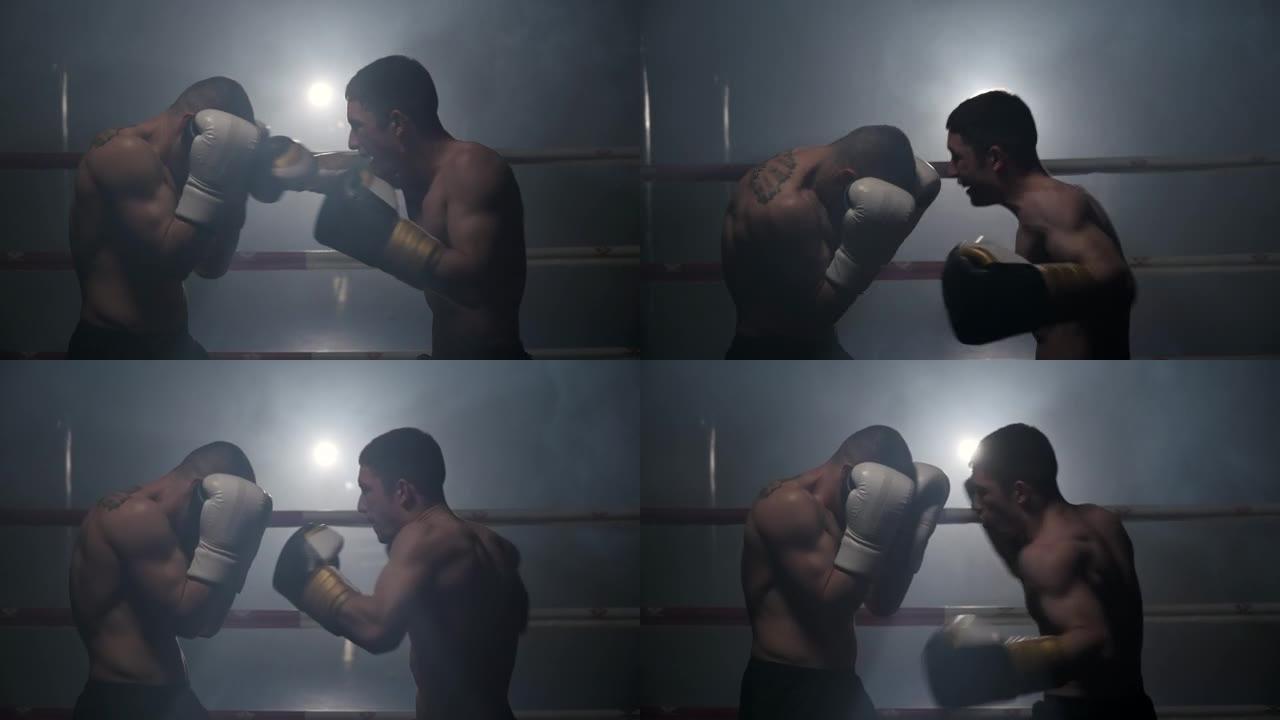 两名专业的年轻肌肉光着膀子的男性拳击手在拳击场上打架的电影慢动作镜头。高质量全高清镜头