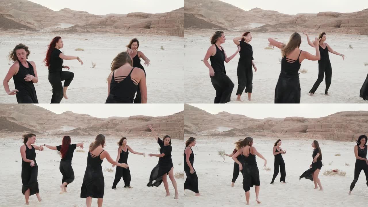 日出时沙漠中练习狂喜舞蹈的女人