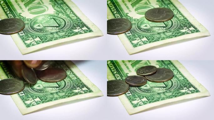 一美元钞票和硬币的特写视图