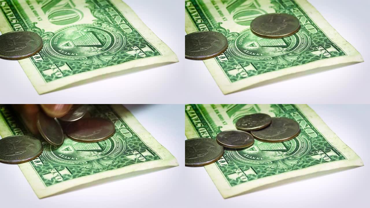 一美元钞票和硬币的特写视图