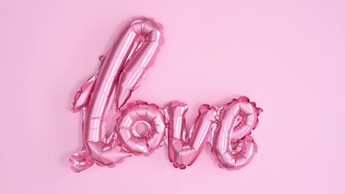 情人节爱情粉彩气球出现。停止运动