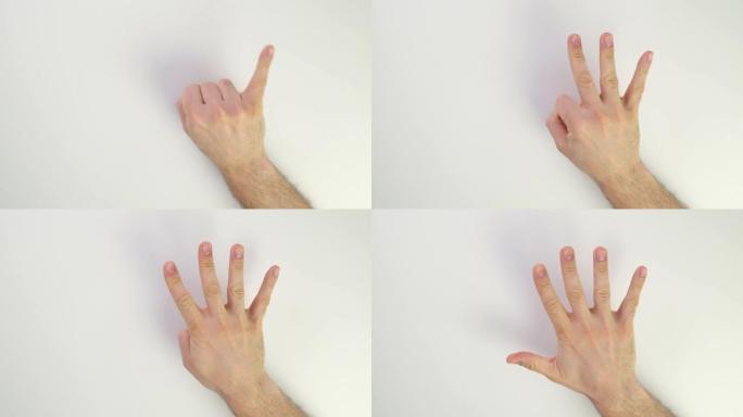 手指从一到十。在白人白人手上显示分数。显示规则或子句的编号。男性的手显示一根手指。从拳头到张开的手掌