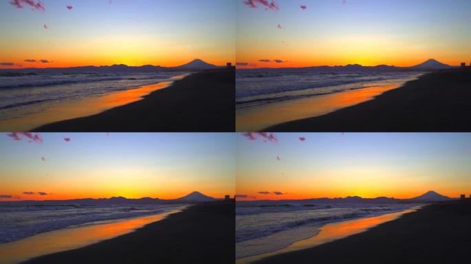 富士山在日落和沙滩上反射夕阳