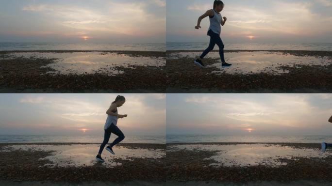 亚洲妇女在早晨日出背景下在海边跑步之前进行热身运动。