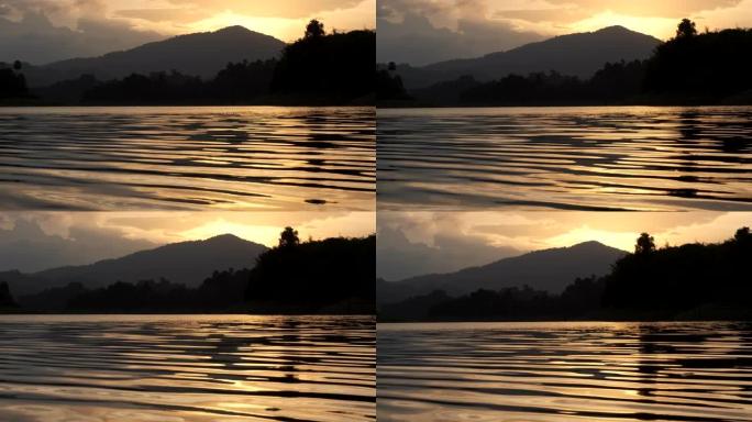 泰国苏拉塔尼 (rajaprabha) 大坝 (泰国桂林) 的乘船旅行。日落时间