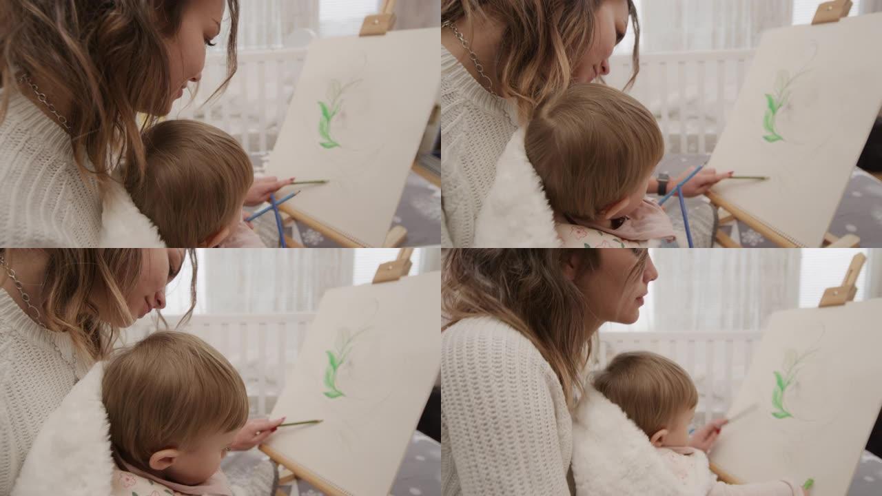 母亲和婴儿在卧室画画。育儿。