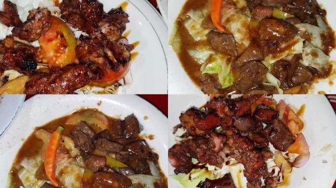 印尼菜称为Sate Kambing或称为羊肉沙爹，放在白盘中