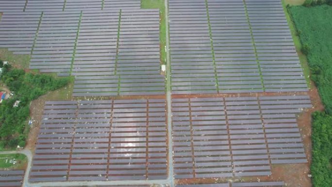 空中无人机飞行飞越太阳能电池板领域泰国可再生绿色替代能源概念