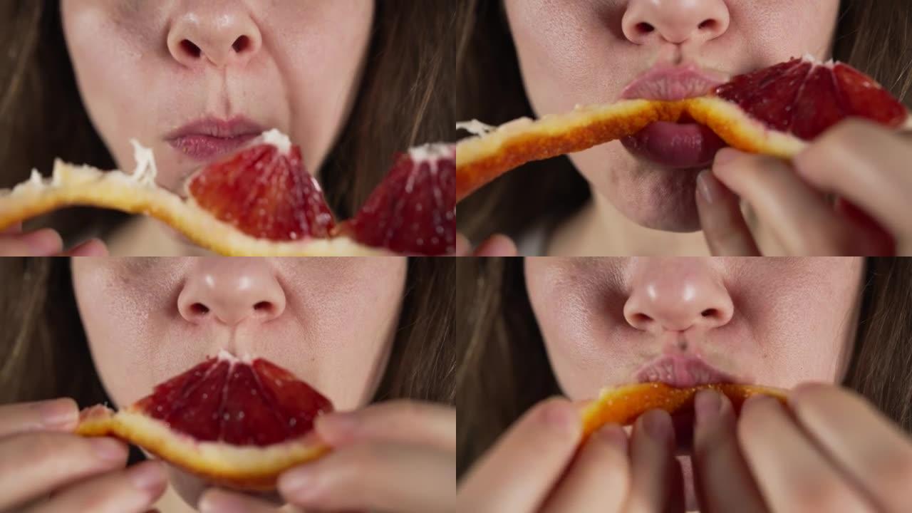 女人吃红橙片特写