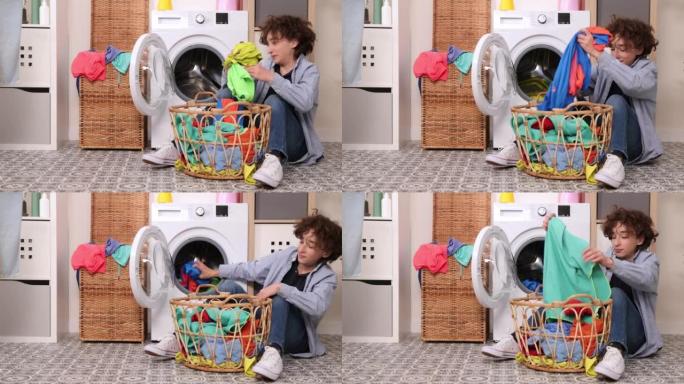 洗脏衣服。衣服闻起来很难闻。一个男孩闻着脏衣服，厌恶地把它们扔进洗衣机