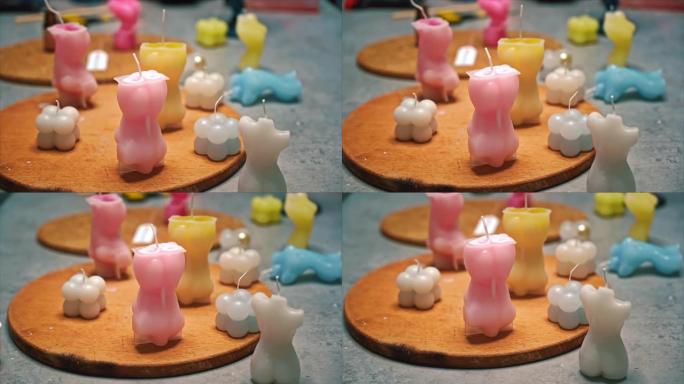 桌上不同形式的手工彩色蜡烛