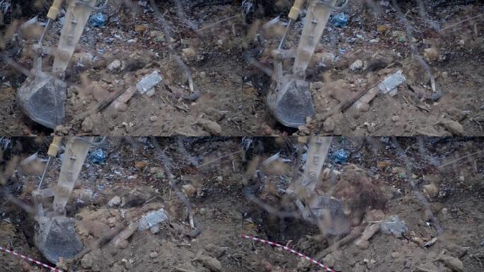 自动扶梯在下雪时挖掘冰冻的地面。冬季乡村旧住宅的解构。城市更新4k高清电影视频