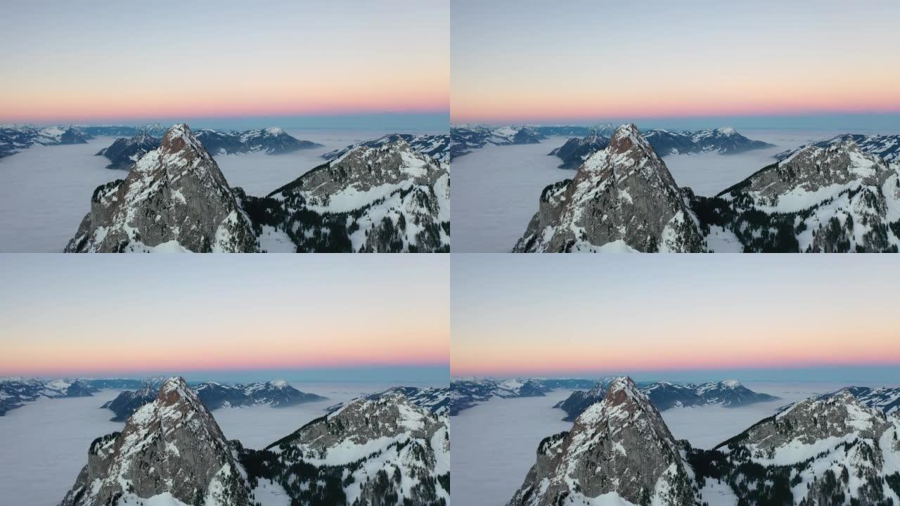 施维茨州瑞士中部疯狂的风景。这个美丽的鸟瞰图是用DJI无人机拍摄的。史诗般的日出，地平线上有美丽的粉