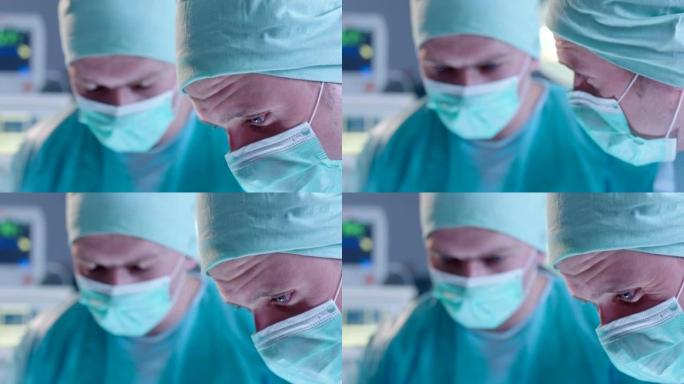 在手术过程中，两名男性外科医生弯腰弯腰躺在手术台上的病人的特写镜头。
