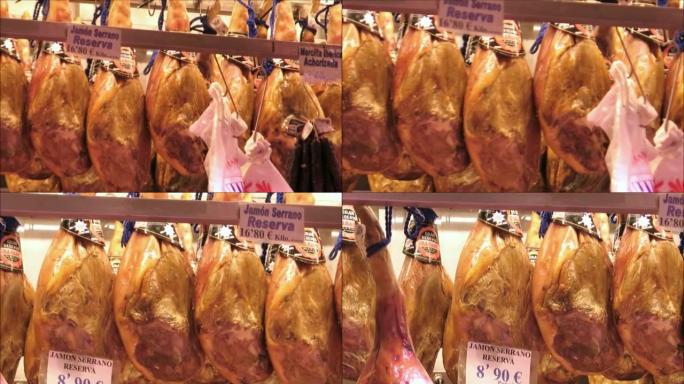 伊比利亚火腿在格拉纳达市场的摊位上出售
