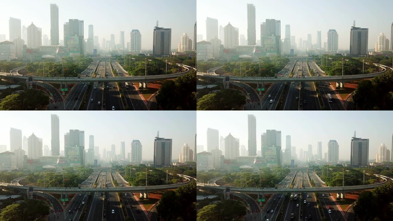 雅加达-印度尼西亚。2017年12月26日: 雅加达具有摩天大楼背景的Semanggi路交叉口的空中