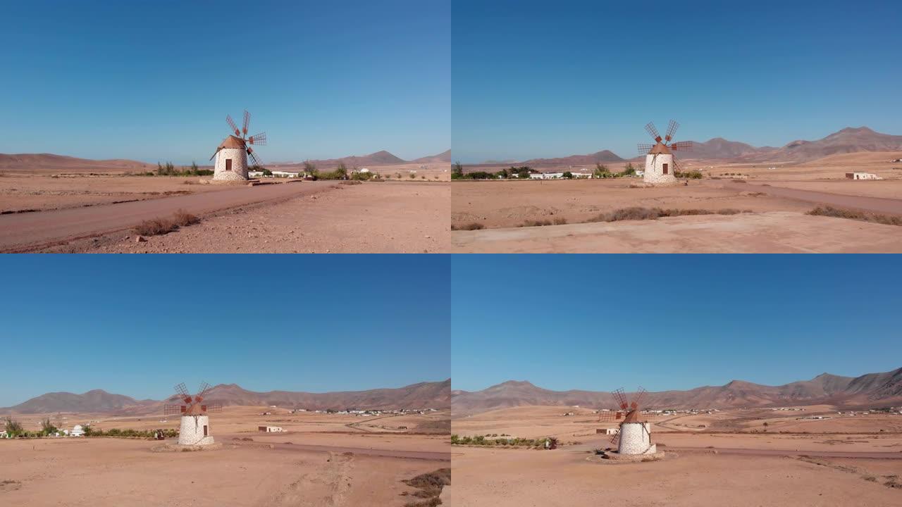 视频无人机鸟瞰图: 奥特加山谷的旧风车。富埃特文图拉