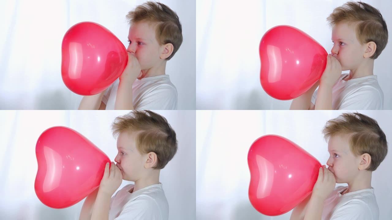 情人节，孩子们。可爱的小男孩在情人节或母亲节给白色背景上的心形气球充气。