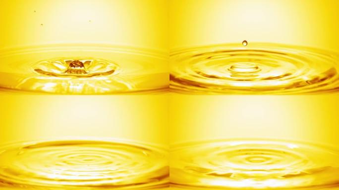 黄色液滴落在黄色液体的表面上，形成圆圈