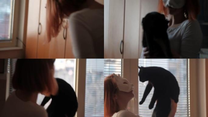 戴着猫面具的年轻女子拥抱黑猫
