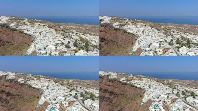 希腊，圣托里尼岛:从空中俯瞰菲拉岛，圣托里尼岛(蒂拉或锡拉)的首府，标志性的白色房屋，高耸在地中海上
