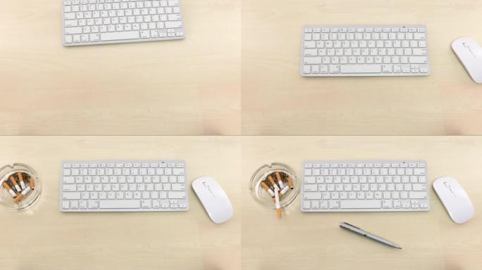 带键盘、鼠标、钢笔、烟灰缸的办公桌。