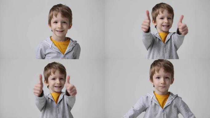 可爱的小男孩表现出竖起大拇指的手势，快乐的面部表情情感