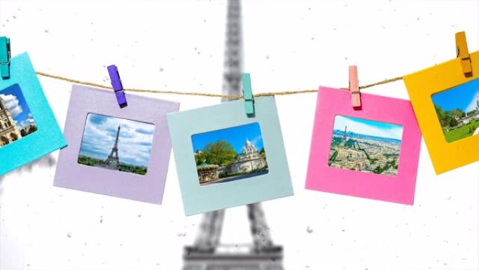 巴黎夏季的主要景点，在冬季的埃菲尔铁塔和巴黎全景的背景下，用衣夹在绳子上的有趣框架中。创意慢动作4k