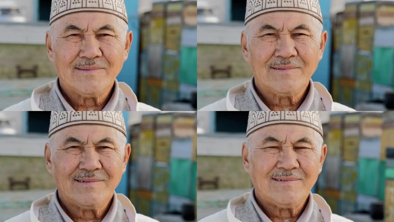 户外养场上微笑的老人或老人农民的亚洲面孔肖像