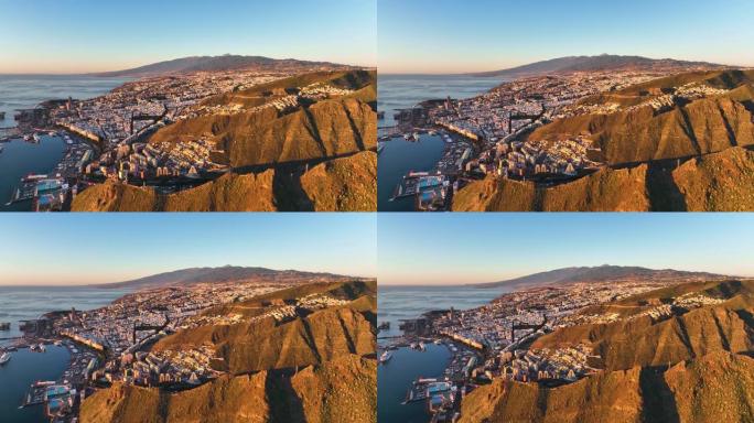 岛上圣克鲁斯-德特内里费镇的俯视图。加那利群岛上港口的鸟瞰图。洛基岛特内里费岛在冬天。加那利群岛附近
