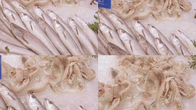 商店柜台上冰上鲜鱼的特写镜头。进口和销售海鲜。