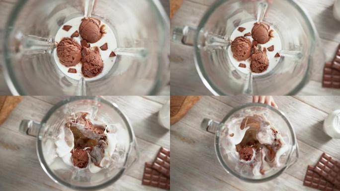 巧克力冰淇淋奶昔混合在搅拌机中慢动作-顶视图，相机移出