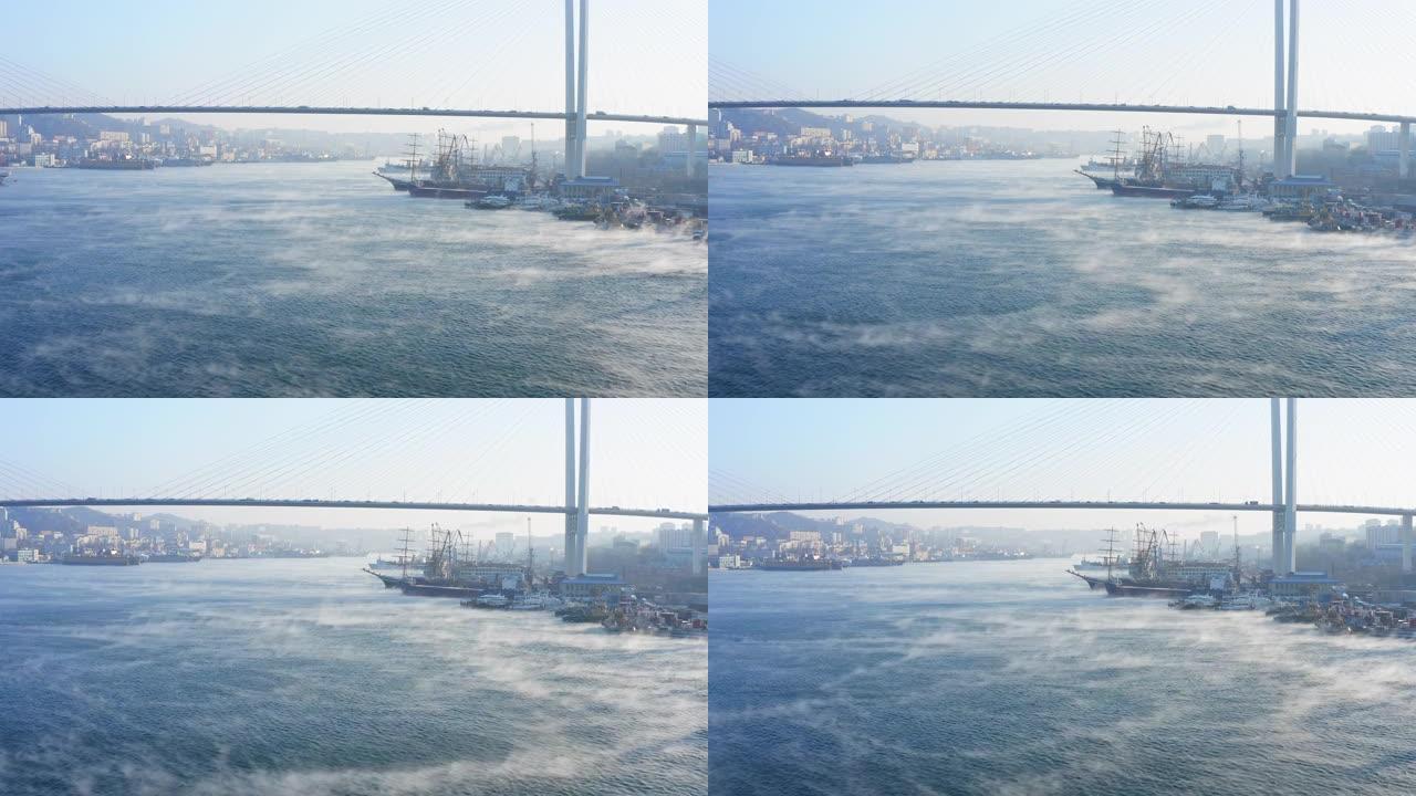寒冷的冬日斜拉桥下海面飙升