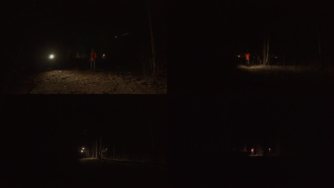 志愿者在夜林寻找失踪者
