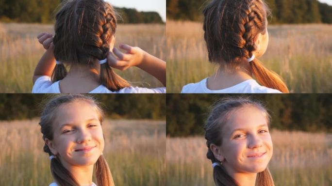 漂亮的小女孩站在草地上，拉直她的金发。漂亮的女孩子转向镜头微笑。夏日草地上快乐的小孩肖像。无忧无虑的