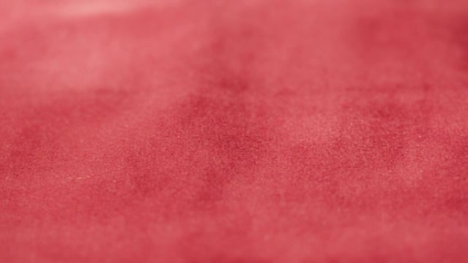 红色天鹅绒质地，柔软优雅的丝绒背景。灯芯绒面料特写