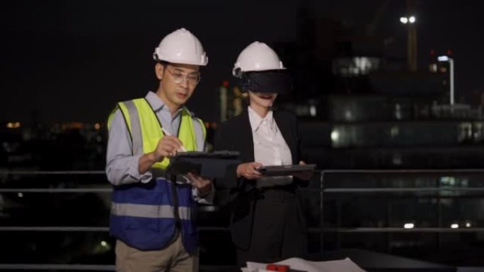 佩戴虚拟现实耳机的亚洲工程师