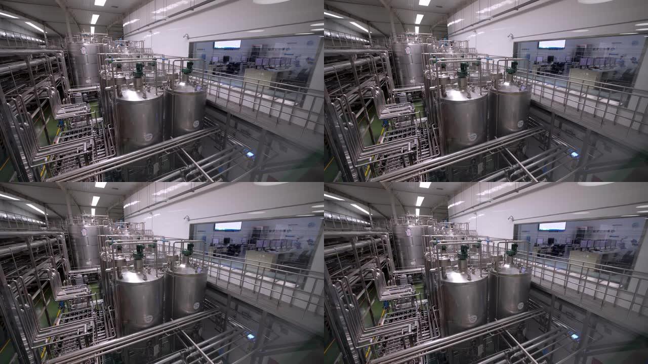 中国乳业工厂，带牛奶罐的内部车间