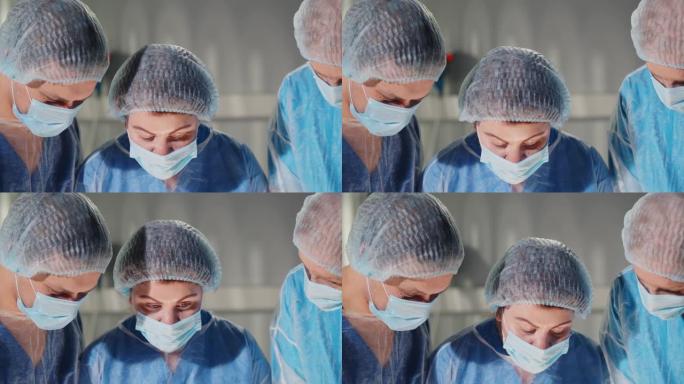 集中的专业手术团队在医院手术室为患者操作。